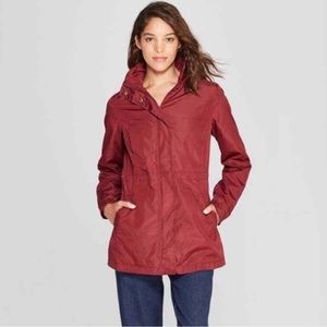 A New Day, Red Rain Coat